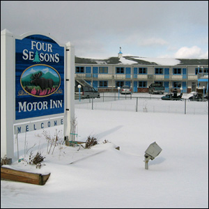 Four Seasons Motor Inn and Sign